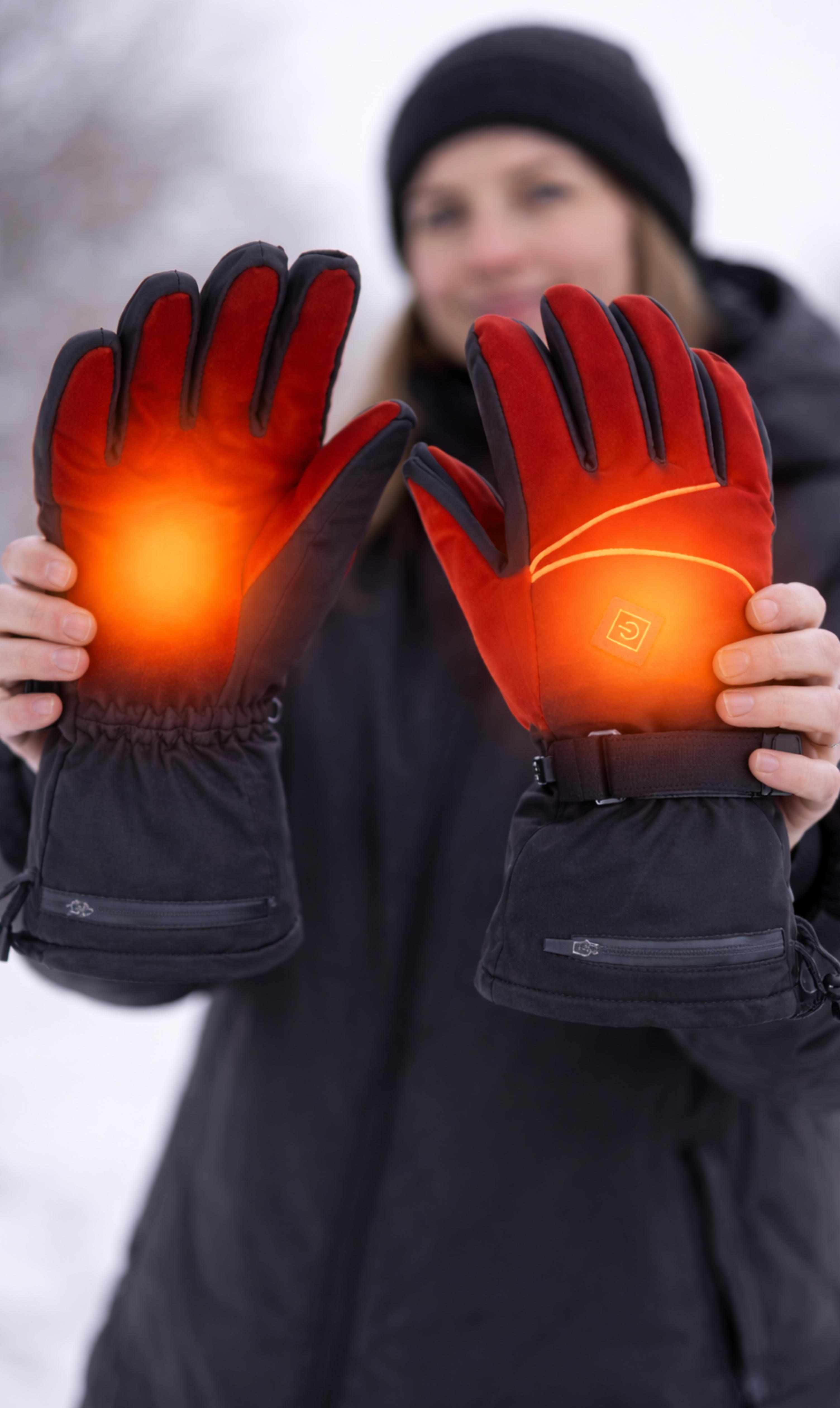 person holding Hotjak Heated Gloves
